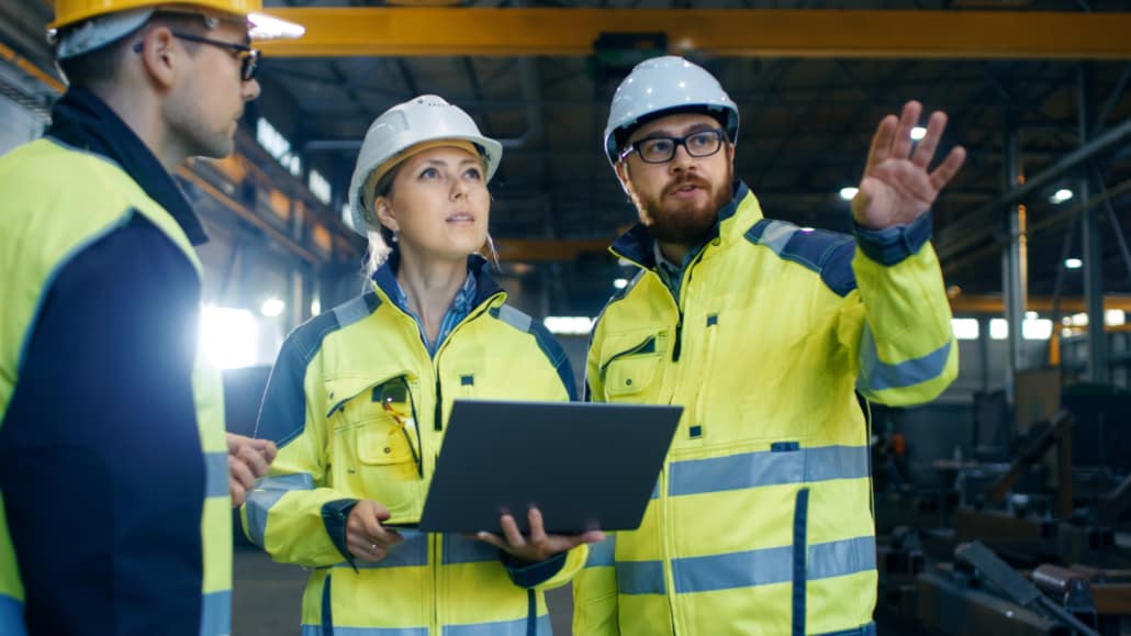 Male And Female Industrial Engineers Talk